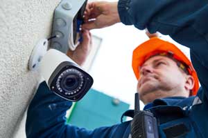 contractor-installing-cctv-system